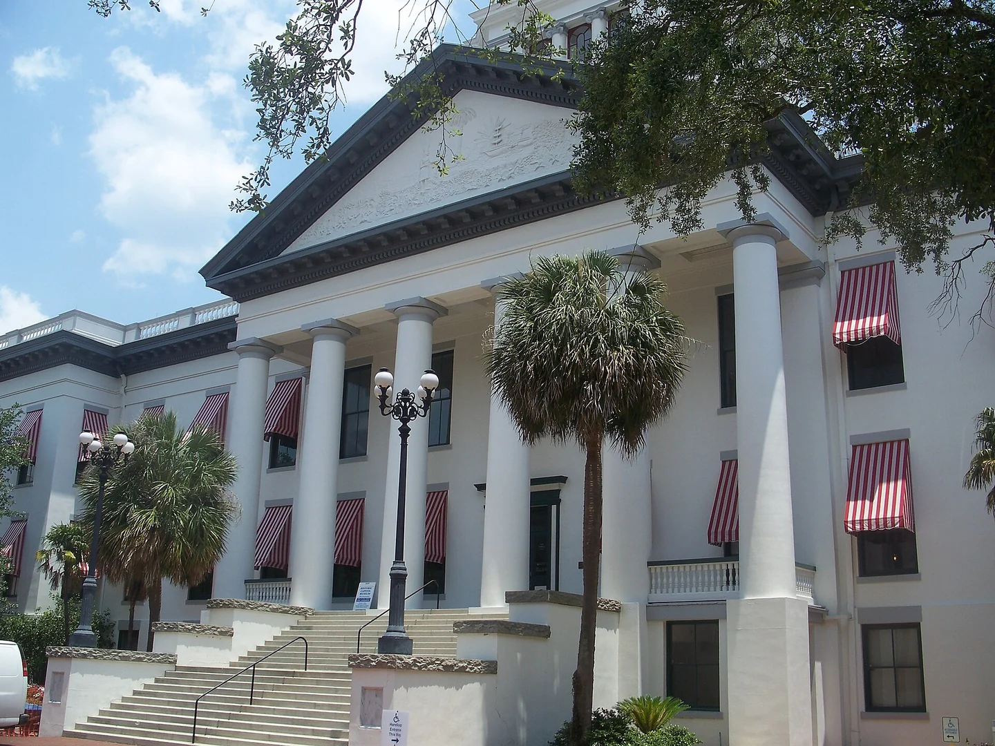 Columned rear entrance and striped awnings of Florida’s Historic Capitol in Tallahassee