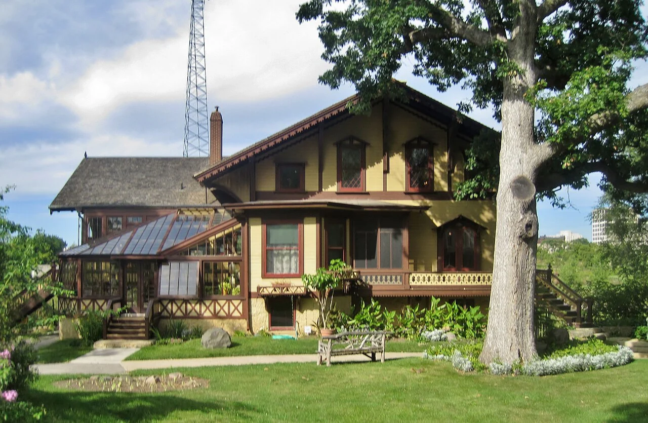 Tinker Swiss Cottage with its timber balconies and landscaped grounds in Rockford.