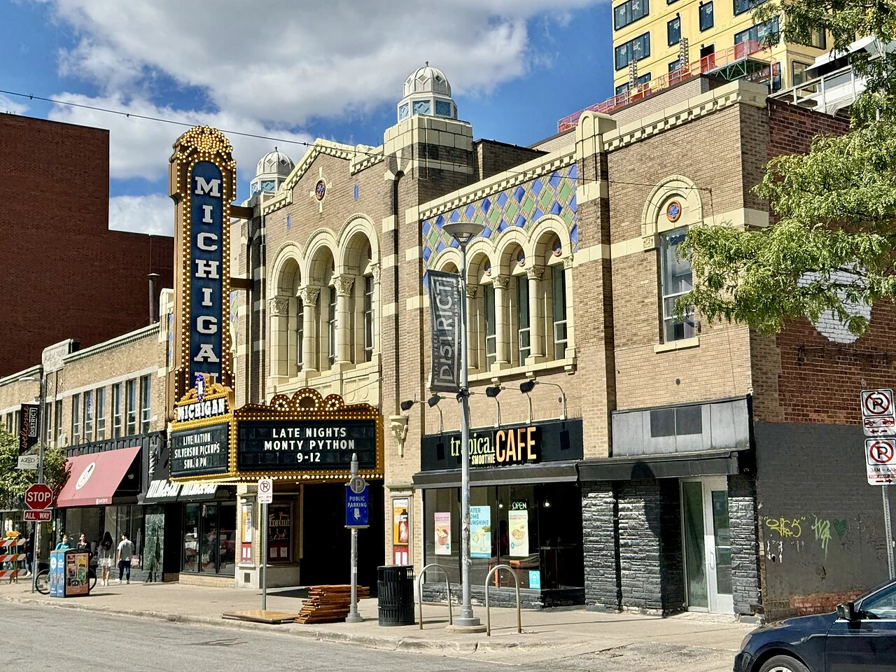 The Michigan Theater’s illuminated marquee and decorative façade on Liberty Street in Ann Arbor.