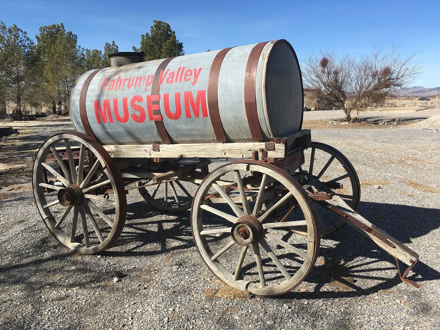 Historic water wagon with the Pahrump Valley Museum name painted on its tank