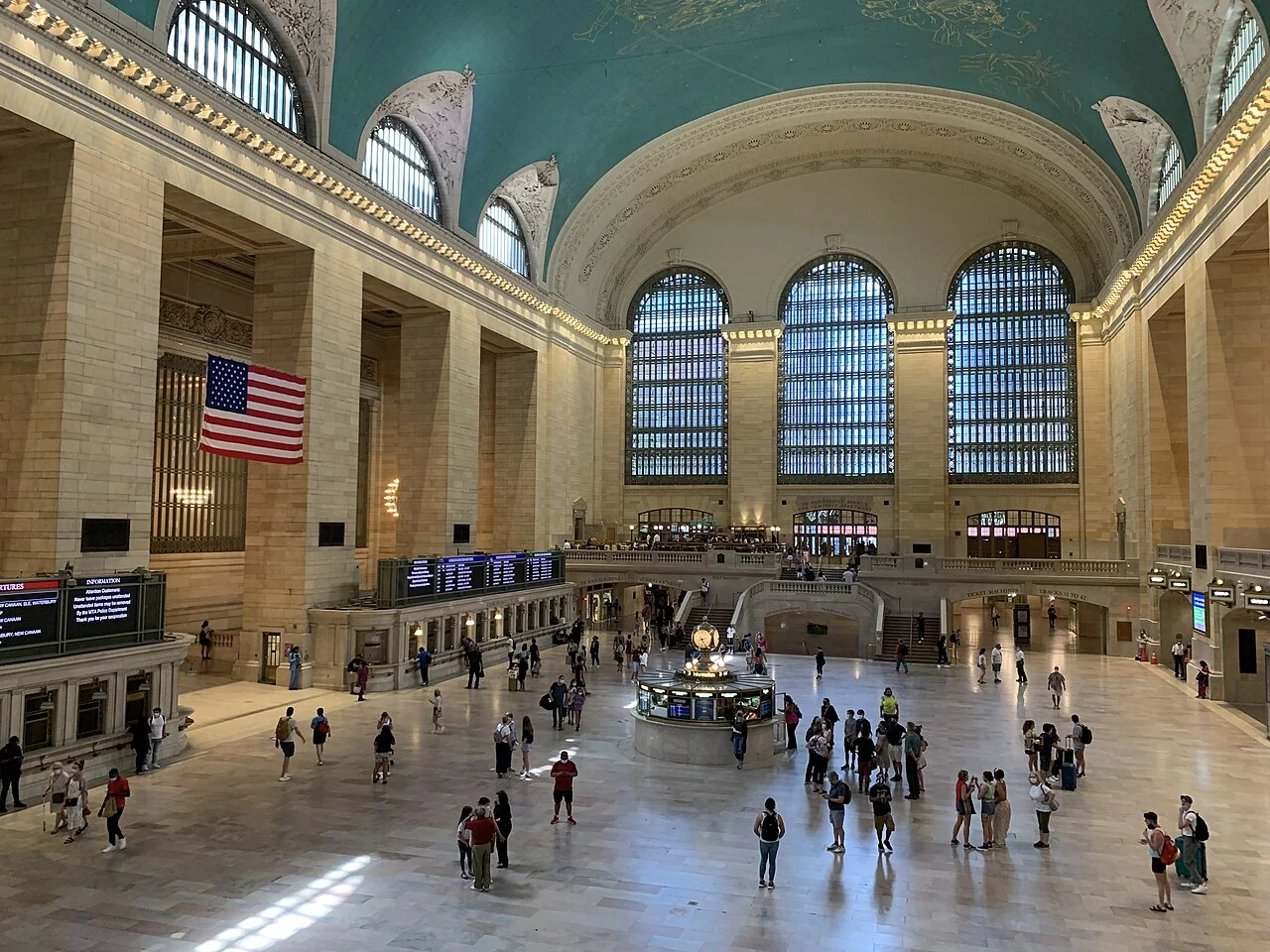 The high arched windows and celestial ceiling above the Main Concourse at Grand Central Terminal.